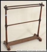 A Victorian mahogany towel rail,