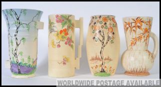 A collection of 4x Bewley Pottery vases, all strongly Art Deco themed.