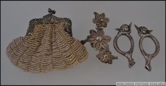 2 silver hallmarked cherub adorned scissor ends marked for Birmingham 1897 21g together with silver