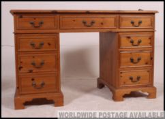 A good quality pine 20th century twin pedestal writing desk.