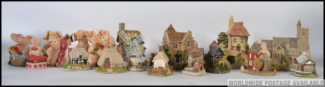 A good collection of highly collectable minature cottages by David Winter and Lilliput Cottages.