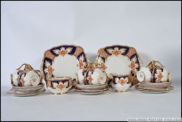 A Royal Albert ' Royalty ' pattern part tea service comprising cups, saucers, plates, sugar bowl,