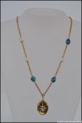 An Edwardian 9ct gold locket necklace set with diamonds and pearls in a layered star setting with