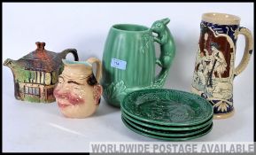 Four green majolica plates, Sylvac squirrel jug,