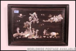 A mid century Chinese mother of pearl inlaid hardwood panel painting.