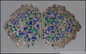 A silver plated and enamel set nurses buckle
