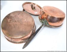 2 Victorian large copper saucepans.