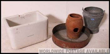 A vintage Twyfords ceramic belfast sink with notation.