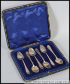 A cased set of silver hallmarked tea spoons,