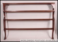 A large early 20th century country pine dresser rack.