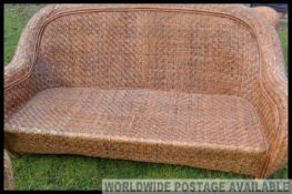 A high quality rattan 3 piece conservatory set with art deco styling (2 chairs + one sofa)