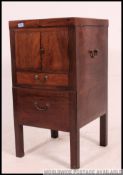 A Georgian 19th century mahogany gentlemans wash cabinet / night stand.