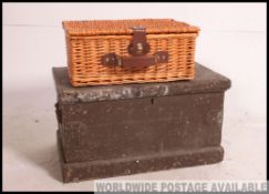 An early top mid 20th century military painted pine ammo box along with a contemporary wicker
