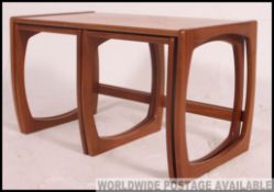 A retro 1970's graduating teak Danish influence nest of tables,