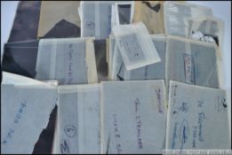 A box of vintage film stills and original printers negatives (for the film stills / lobby cards).