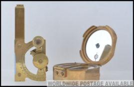 A brass compass ' Natural Sine ' Stanley London along with a minature brass sextant,