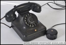 A vintage mid 20th century German bakelite telephone,