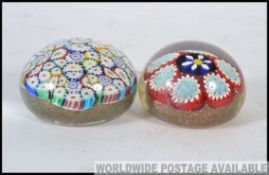 2 Millefiori caned glass paperweights,