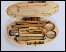 A 19th century ivory cased sewing set, the ivory case of lozenge form being, monogrammed to the lid.