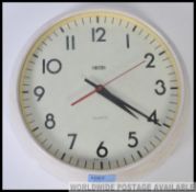 A vintage retro 20th century industrial Smiths quartz circular factory / school wall clock