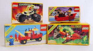 LEGO: A collection of 4x vintage Lego sets - Town and space related to include; Town 6674,