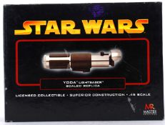 MASTER REPLICA LIGHTSABER: An original Star Wars .45 scale Master Replica Lightsaber.
