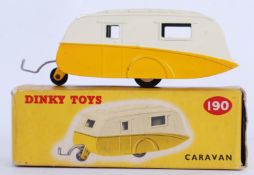 DINKY: An original vintage Dinky Toys 190 Caravan diecast model. Two tone cream and yellow.