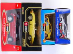 BURAGO: A collection of 4x Burago larger scale diecast model cars (2x 1:18 and 2x 1:24 scale).