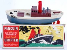 PENGUIN DRIFTER: An original vintage Penguin Series 4 ' Drifter ' clockwork model boat,