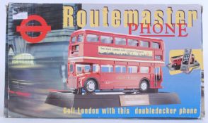 ROUTEMASTER PHONE: An original novelty Routemaster Bus telephone. Made by London Transport 1997.