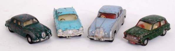 SPOT ON: A collection of 4x vintage Spot On diecast model cars to include a Jaguar 3.