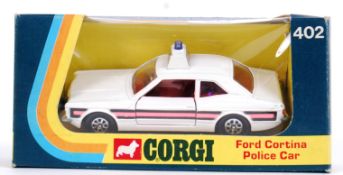 CORGI: An original vintage Corgi 402 Ford Cortina Police Car diecast model - within the original