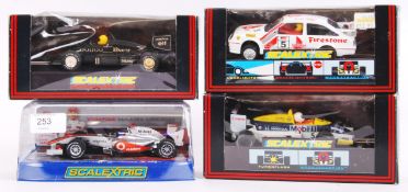 SCALEXTRIC: A collection of 4x boxed Scalextric racing cars - box numbers C3046, C425,