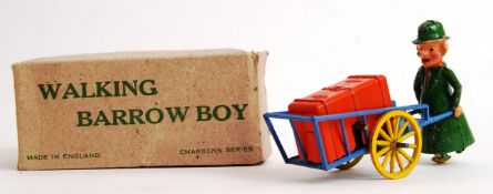 CHARBENS BARROW BOY: A rare vintage clockwork and lead Charbens ' Walking Barrow Boy'.