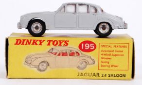 DINKY TOYS: An original vintage Dinky Toys diecast model 195 Jaguar 3.4 Saloon. In grey.
