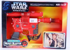 STAR WARS: A Star Wars Power Of The Force Electronic Heavy Blaster toy weapon.