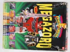 POWER RANGERS: An original Bandai made Power Rangers Deluxe Megazord set. Within the original box.
