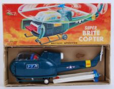 BATTERY OPERATED: An original vintage SH Battery Operated plastic ' Super Brite Copter ' helicopter