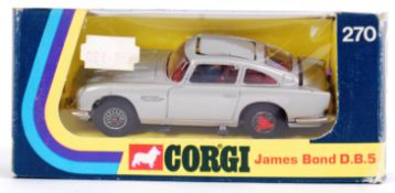 CORGI JAMES BOND: An original Corgi 270 James Bond Aston Martin DB5, with red spikes to the wheels.