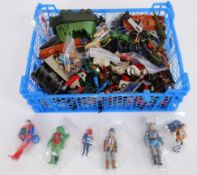 ACTION FIGURES: A collection of vintage assorted small size action figures - mostly 1980's - to