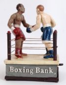 MONEY BOX: A 20th century cast iron hand painted style money box in the form of a Boxing ring.