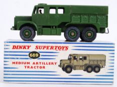DINKY TOYS: An original vintage Dinky Toys military diecast model 689 Medium Artillery Tractor.