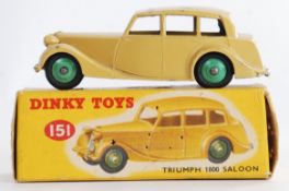 DINKY: An original vintage Dinky Toys 151 Triumph 1800 Saloon diecast model car.