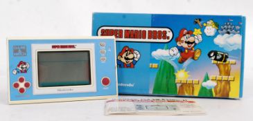 NINTENDO GAME & WATCH; An original vintage Nintendo Game & Watch Super Mario Brothers pocket game.