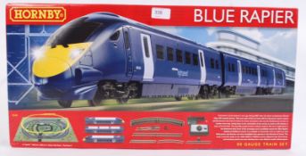 HORNBY: A Hornby 00 gauge R1139 Blue Rapier railway trainset.
