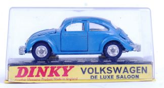DINKY: An original vintage Dinky diecast model 129 Volkswagen De Luxe Saloon.
