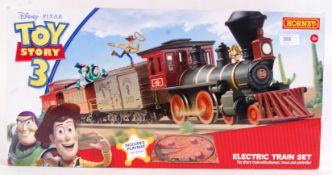 HORNBY: A Hornby 00 Gauge Toy Story 3 Electric Train Set. 00 Gauge, contents appear possibly unused.