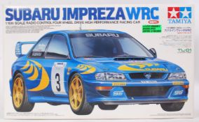 TAMIYA SUBARU IMPREZA: An original Tamiya Subaru Impreza WRC radio controlled car TL-01.