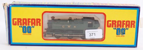 GRAFAR: A Grafar railways 00 gauge GWR 9410 railway trainset locomotive, within the original box.