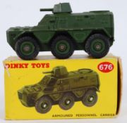 DINKY: An original vintage Dinky Toys military 676 diecast model Armoured Personnel Carrier.